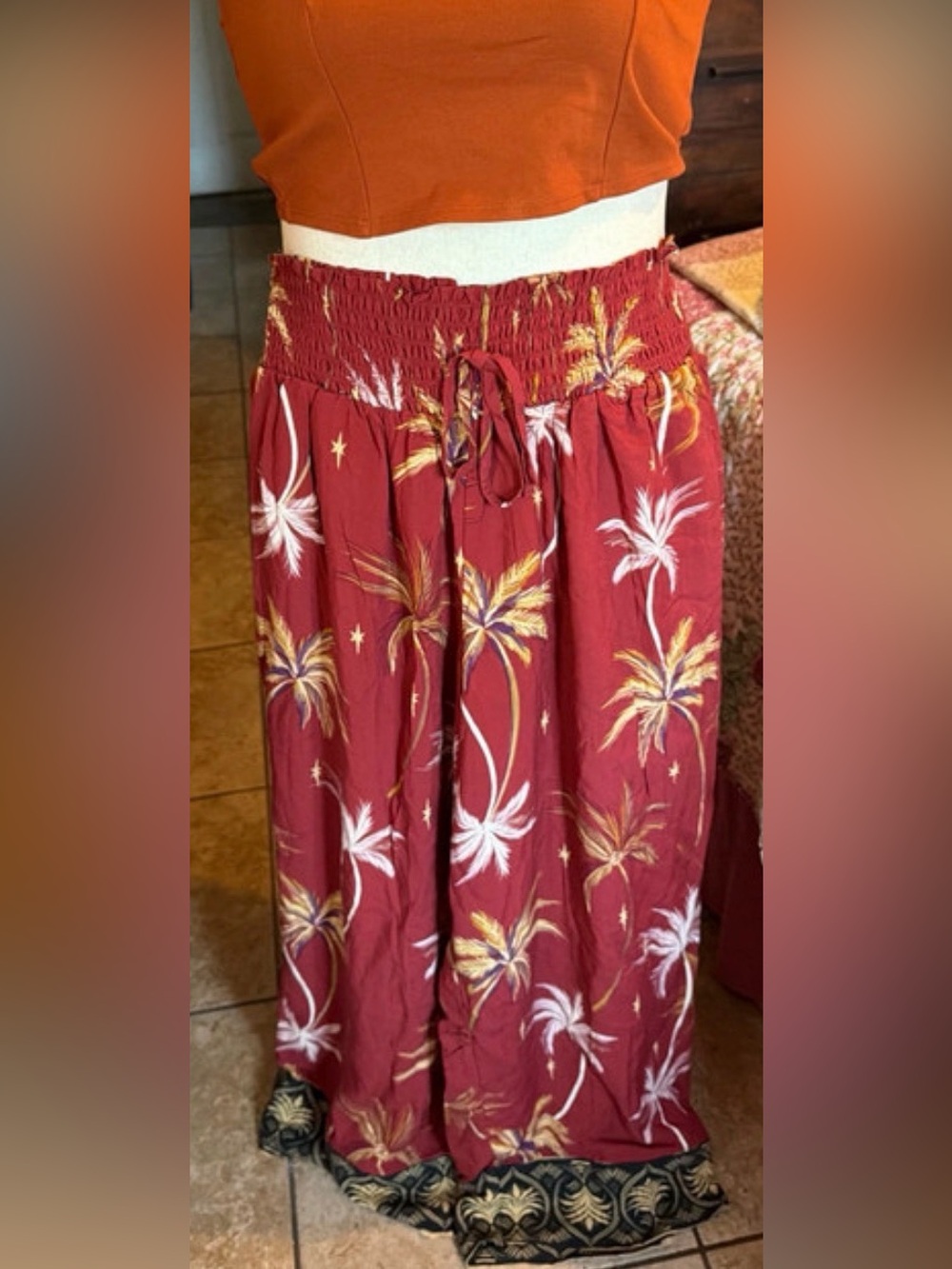 2 kathy ireland Pants:Black /Red Tropical Print Pants with Black Smocked Panel